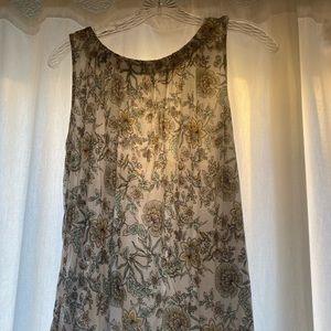 Like-new tank top. Baggy fit. Neutral pattern with light blues and browns.